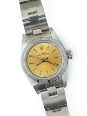 Rolex Oyster Perpetual 67230 26mm Champagne Dial Creme